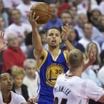 Warriors guard Stephen Curry took a shot over Blazers guard C.J. McCollum (left) and center Mason Plumlee during the second half. Curry, who sprained his right knee in the first round, scored 40 points in his return to the lineup.